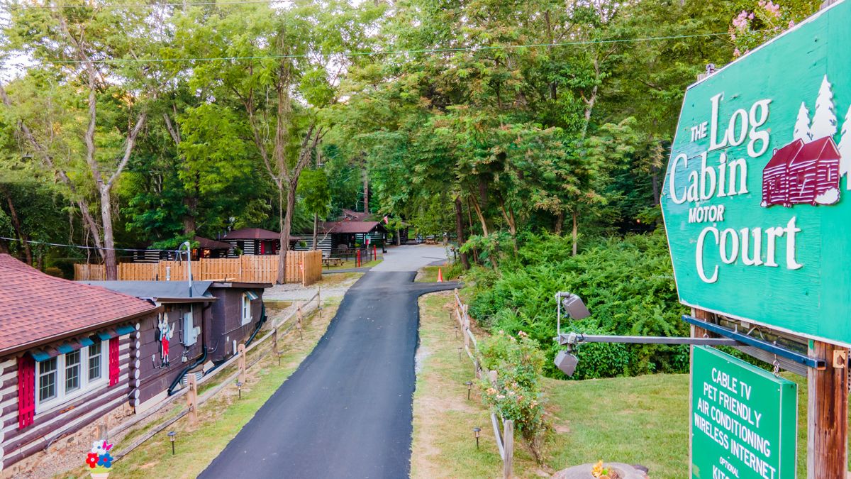 Main entrance to the log cabin motor court offering cabins for rent in the blue ridge mountains NC